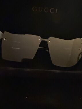 Gucci Rimless Shield Sunglasses in Smoke Black